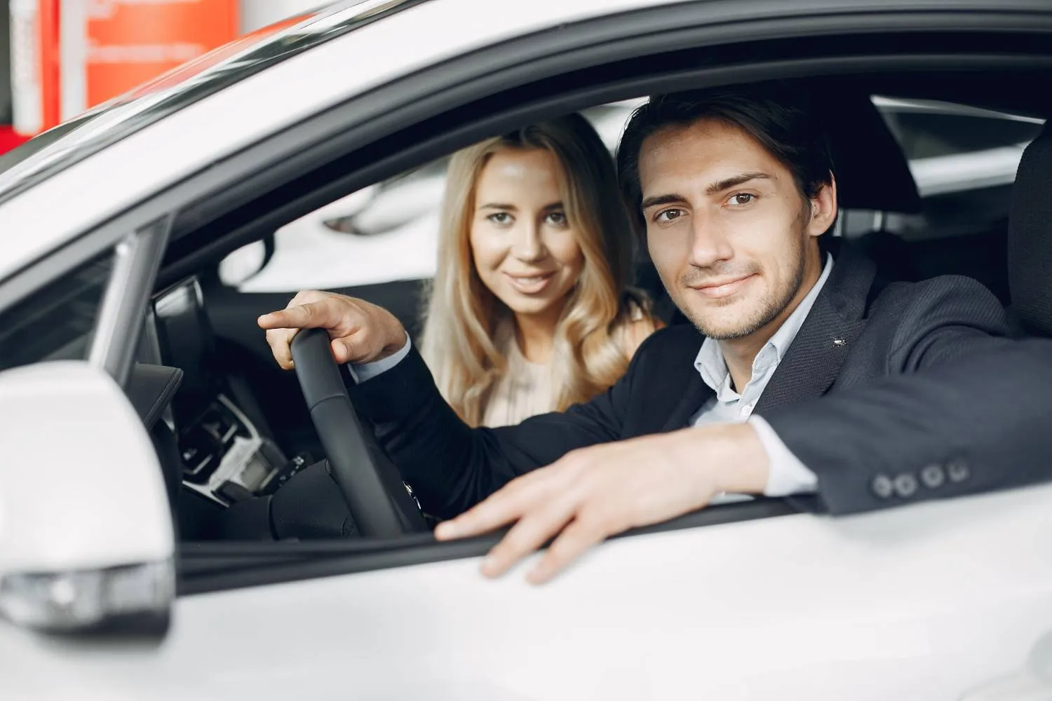 Driver checking vehicle details before setting off